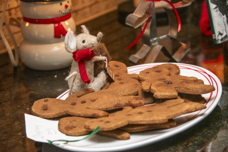 A felted mouse watches over the gingerbread men on the table at Geri Ludlam and Connie Heindel‘s Hudson Road home.